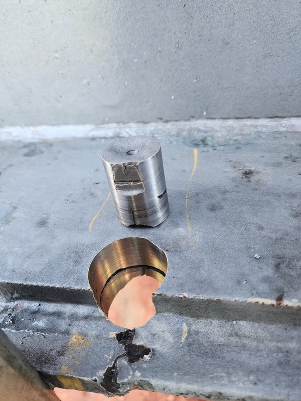 Core sampling and testing of steel structures