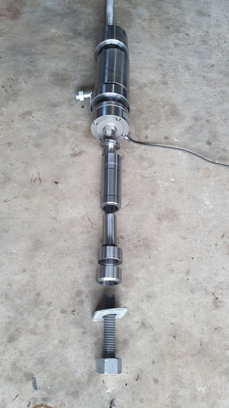 Mechanical assembly for pullout testing of hold down bolts