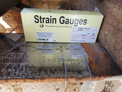 installation of strain gauges to measure load in bridge girders